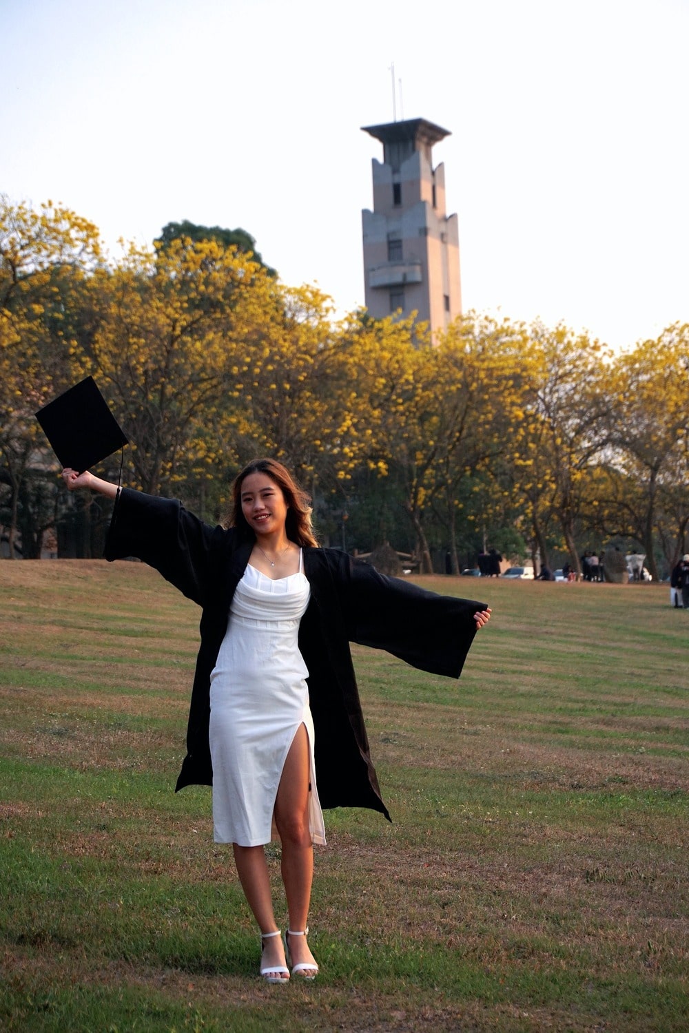 Babe at CCU campus with tower in the background